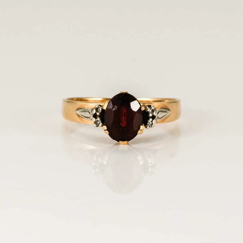 Garnet engagement ring before restoration, front on