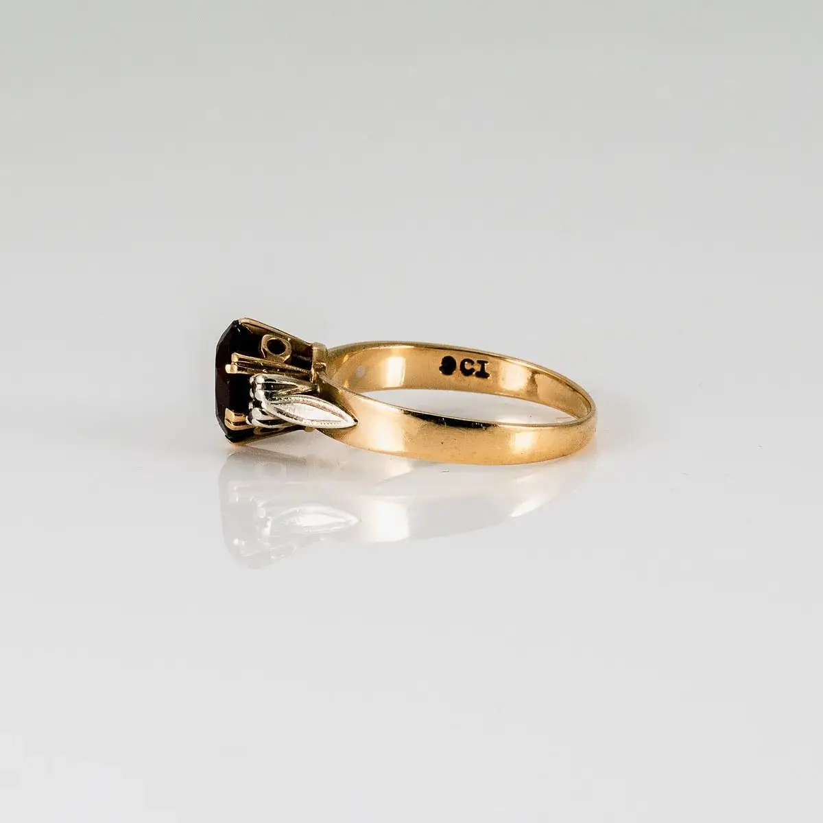 Garnet engagement ring before restoration, in profile